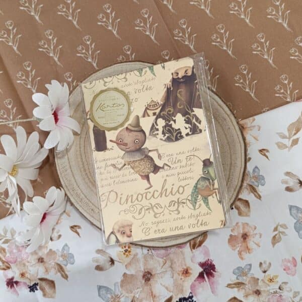 Cuaderno bordes oro Pinocho A6. Kartos